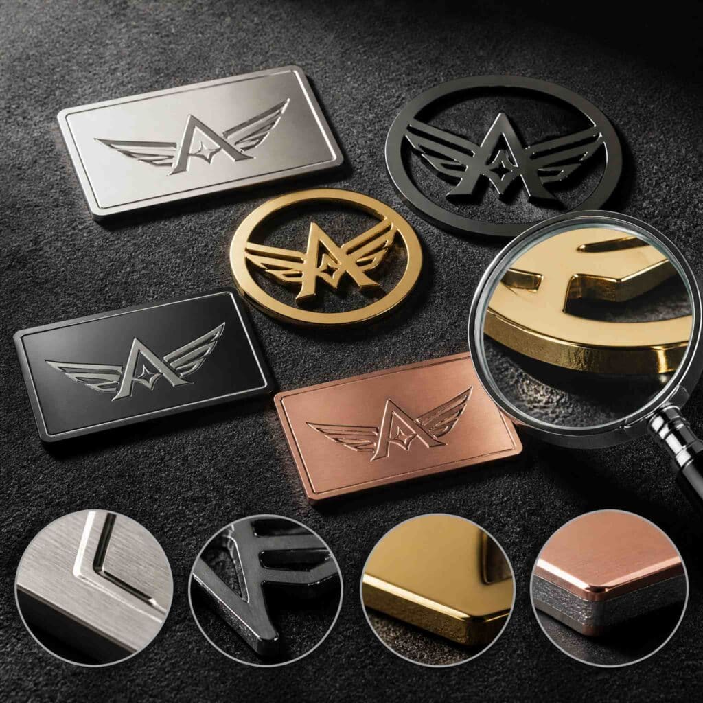 Etched and cut logo jewelry components